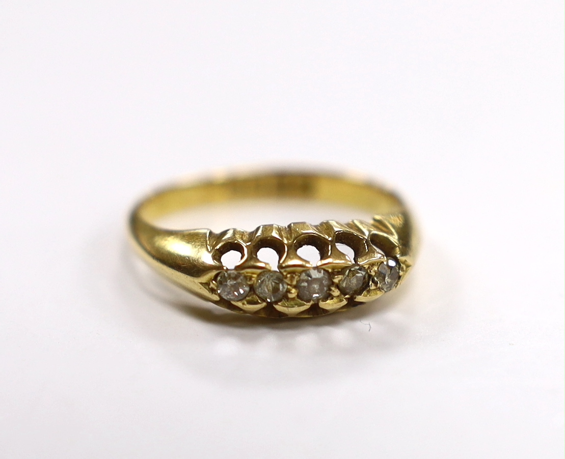 A George V 18ct gold and five stone diamond chip set half hoop ring, size M, gross weight 3.1 grams.